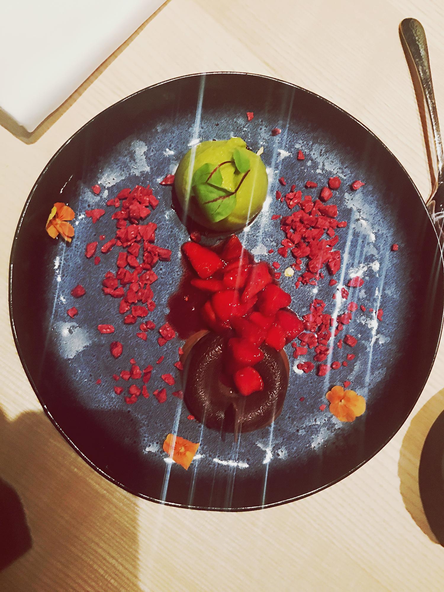 Food stylist arranging plate